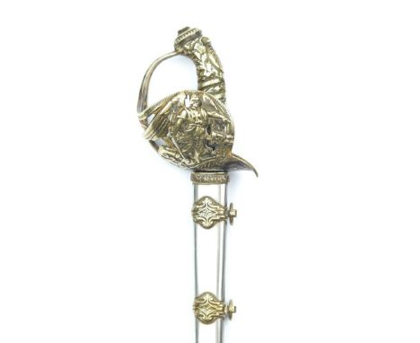An Imperial German sword form letter opener, 22cm plated blade, characteristic brass hilt, the guard embossed with St George 
