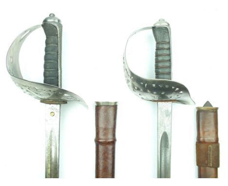 An 1897 Pattern Infantry Officer's sword, 82cm blade by ROBT MOLE & SONS BIRMINGHAM, etched with scrolling foliage, crowned R