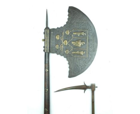 A large Indian axe, 31cm chiselled and pierced head decorated with scrolling foliage, flower heads and applied brass courtly 