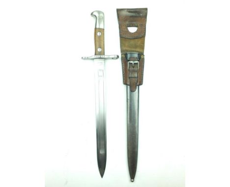 A Swiss Model 1889/11 Bayonet, 29.5cm deeply fullered blade by NEUHAUSEN and with scabbard ridge machined into the fuller, re