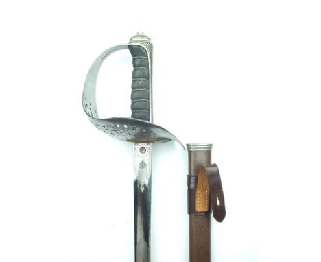 An 1897 Pattern Infantry Officer's sword, 83cm blade by ARMFIELDS LTD BIRMINGHAM, etched with scrolling foliage, crowned Roya