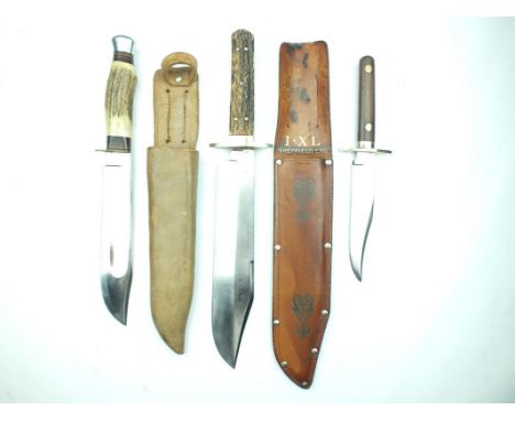 A large Bowie knife by George Wostenholm & Son, 25cm clipped back blade stamped with a maker's mark G. WOSTENHOLM & SON WASHI
