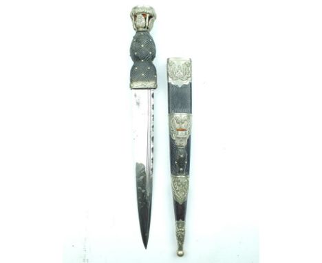 A Gordon Highlander's Officer's or NCO's dirk, 25cm fullered blade with faceted back edge, characteristic wooden hilt with ca