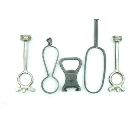 Five various cartridge extraction tools, two on the pincer principle, two dual extractors for 20 and 12-bore and a combinatio