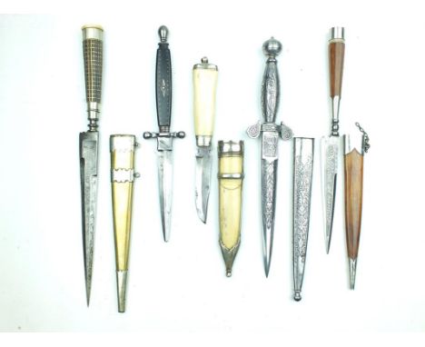 A Corsican Vendetta knife, of characteristic form, contained in its white metal mounted brass scabbard, together with another