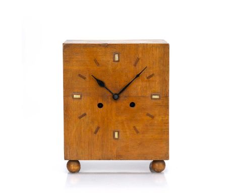 Art Deco styleOak, marquetry inlaid clock, standing on bun feet, 19cm wide x 23.5cm high x 12cm deepOverall wear and scratche