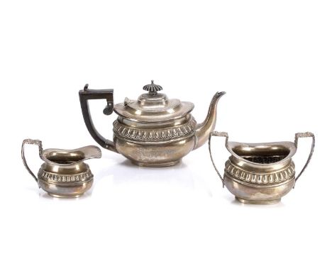 Edward VII three-piece silver tea set Comprising of: a silver teapot with ebonised handle, bearing marks for George Nathan & 