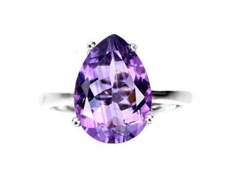 A 925 silver  ring set with a pear cut amethyst, (O).