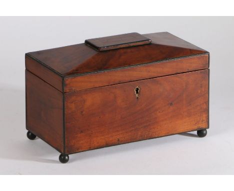 George III mahogany sarcophagus shaped tea caddy, with ebonised banding the lid opening to reveal two compartments each with 