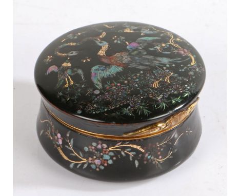 18th century black lacquered tortoiseshell snuff box, of circular form, the hinged cover with foliage and birds attacking a s