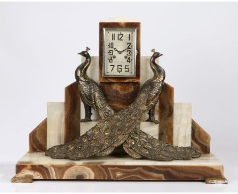 Substantial Art Deco marble mantle clock, the white dial with angular Arabic numerals, the brown and cream marble base with t