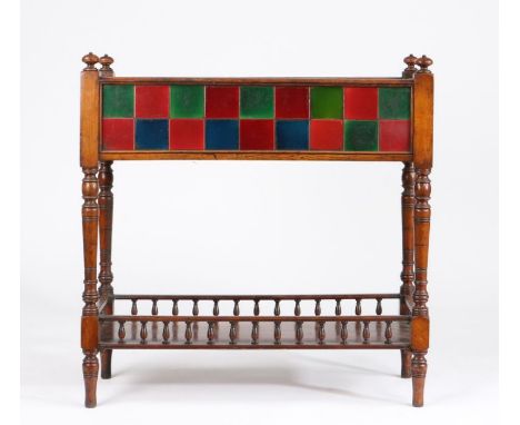 Victorian oak and tiled jardinière, of rectangular form with four turned finials above the brown and mottled tile decorated l
