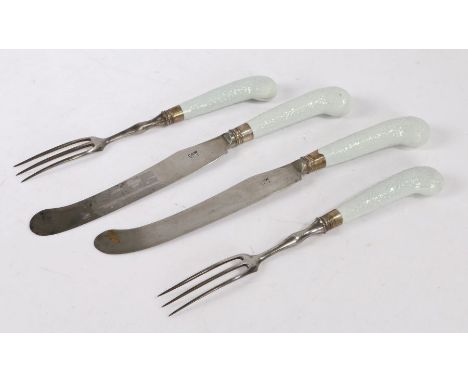 Two pairs of Royal Worcester Chrysanthemum pattern knives and forks, circa 1775, with texture pistol grip handles, the blades