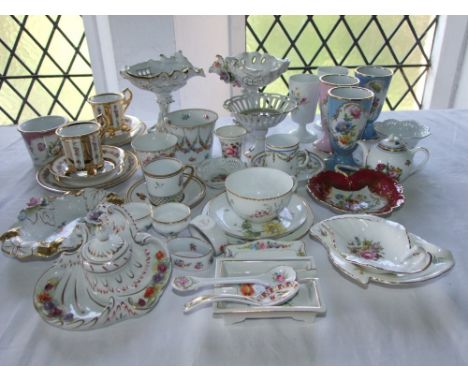A collection of continental and other decorative ceramics including a pair of dishes with pierced floral encrusted decoration