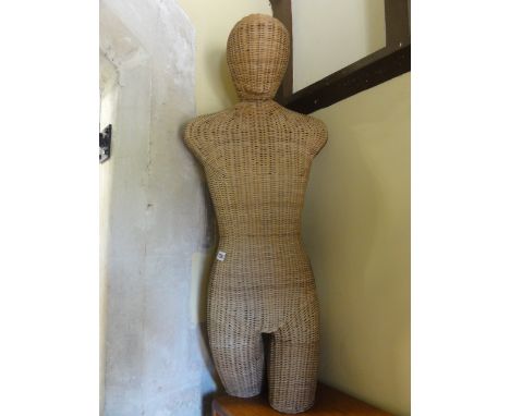 A wicker work mannequin with head, 100 cm high approx