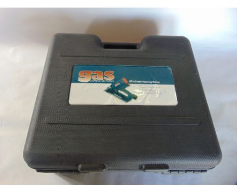 A cased Axminster tools gas framing nailer gun GFN3490