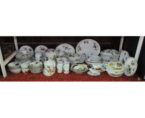 An extensive collection of Royal Worcester Evesham pattern wares including a large cylindrical jar and cover, an oval tureen 