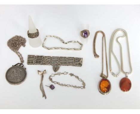 A collection of silver jewellery to include a gate link bracelet, a paste set silver ring, a marcasite and silver ring and a 