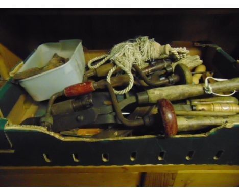 Two trays containing a collection of vintage hand tools including four Stanley planes, a number of brace and bits and other v