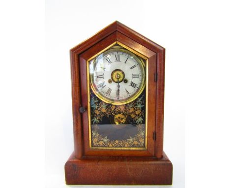 A walnut veneered glass fronted American shelf clock, with two train circular 5 inch dial and painted glass front, 39 inches 