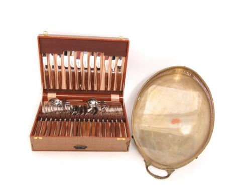 A twin handled silver plated gallery tray of oval form together with a cased set of gloss wood stainless steel flatware