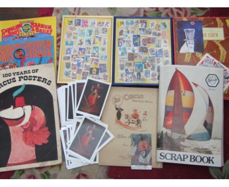 Two scrapbooks containing a collection of circus and clown postcards, various vintage circus booklets, two framed collections