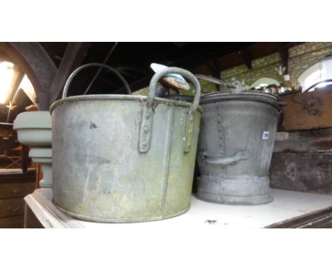 A collection of galvanised ironware including coal scuttle, oval tubs, buckets, etc, together with an interesting collection 