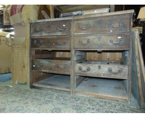 A vintage shop/commercial chest, each fitted with two banks of three drawers with heavy duty brass swan neck handles, 125 cm 