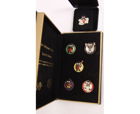 The Golympic Games cased set of five enamel badges 159/2,000 together with a Millennium Golly 2000 (cased)
