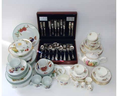 A collection of Minton Marlow pattern wares including cream jug, four dessert plates, four dessert or soup bowls, five cups (
