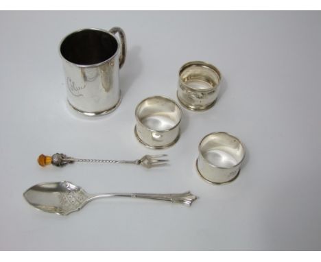 A collection of Victorian and later silver items to include, 3 napkin rings, a small tankard, a sugar spoon and a novelty pic