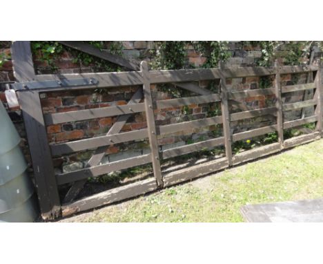 A large field gate with later painted finish