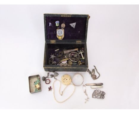 A small collection of sterling slver items to include a bookmark, bangle, albert chain, thimble, etc, together with a carved 