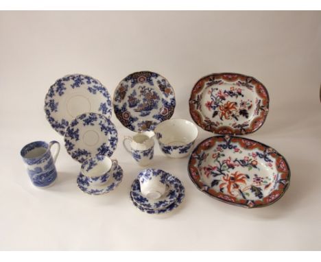 A collection of mainly 19th century ceramics including blue and white floral printed tea wares comprising a pair of cake plat