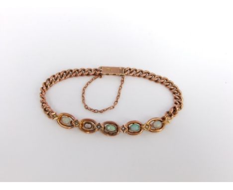 An early 20thcentury 9ct gold, black opal and seed pearl bracelet (one vacant setting), 7.5 g