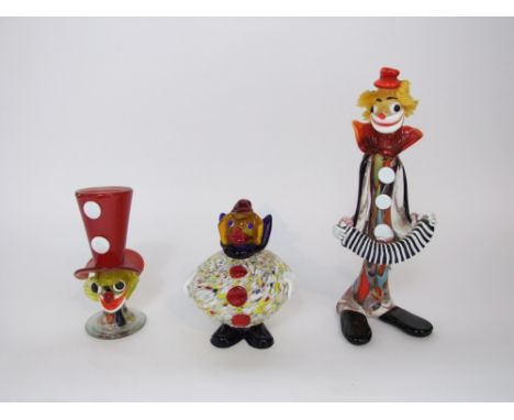 A Murano glass type figure of a standing clown playing an accordion, 13 cm tall, together with a further similar glass model 