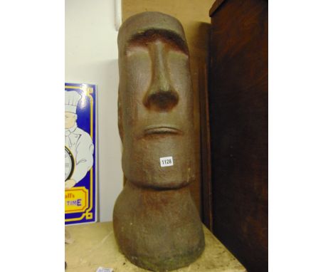 A salt glazed umbrella/stick stand in the form of an Easter Island head, 70cm tall