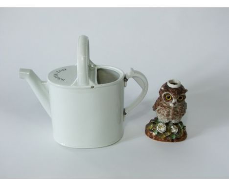 A Victorian ceramic lamp base modelled as an owl with glass eyes and impressed registration mark to base 17cm tall, together 