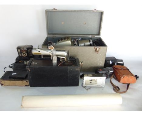 A box of vintage photography equipment to include cameras, photographs, etc