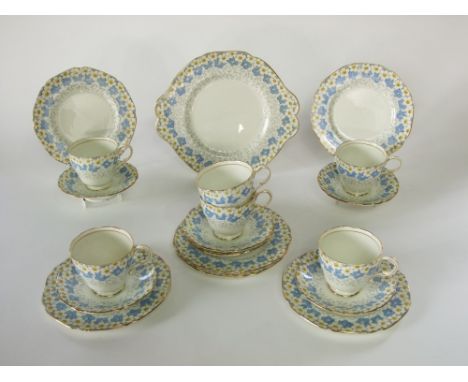 A collection of Paragon China May Blossom pattern tea wares comprising cake plate, six cups, six saucers and six tea plates
