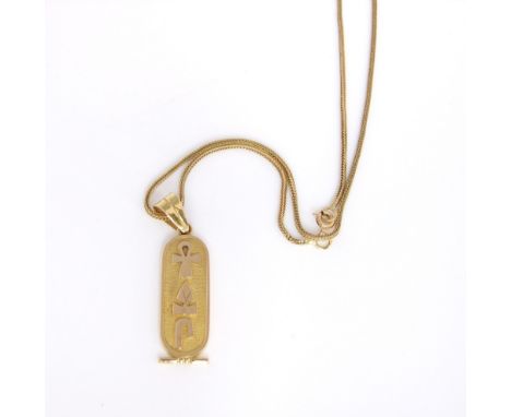 An unmarked yellow metal Egyptian gold plaque pendant with gold rope link chain, 10g approx