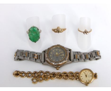 Three 9ct gold rings, one set with carved jade stone, second set with three melee cut diamonds and a luckenbooth ring togethe