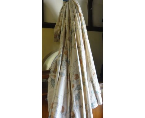 A pair of cream ground linen curtains with printed abstract floral design complete with tie backs, 195 cm drop x 110 cm pleat