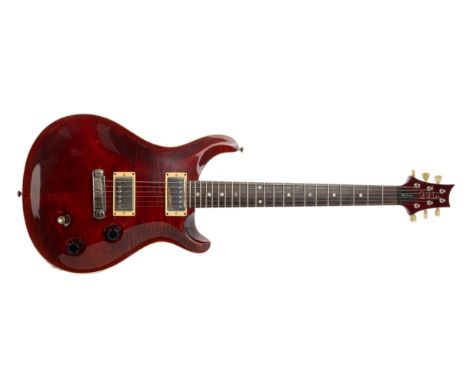 264644, black cherry body, with original hard shell case   Condition overall is good, with some light damage present and gene