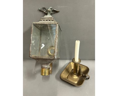 A coach lantern and candle holder 
