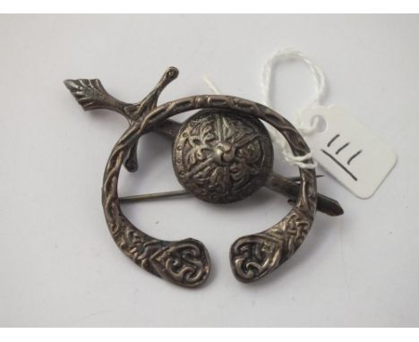 Two Celtic style silver brooches
