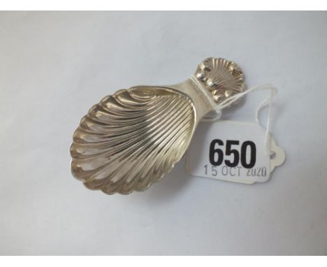 A caddy spoon with shell decoration - B'ham