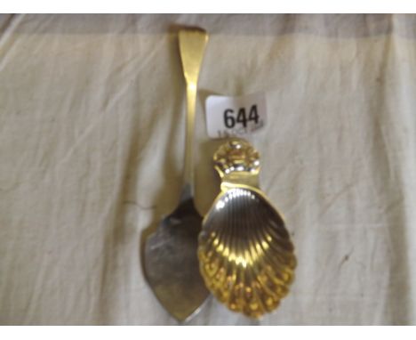 A shell decorated caddy spoon and an Irish Victorian jam spoon