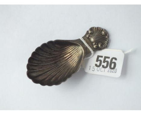 A shell decorated caddy spoon - London 1982 