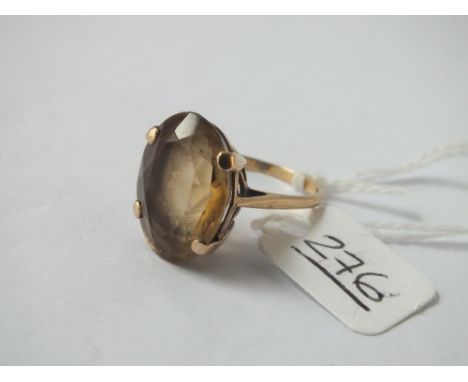 A large Smokey quartz einf in 9ct - size R - 5gms